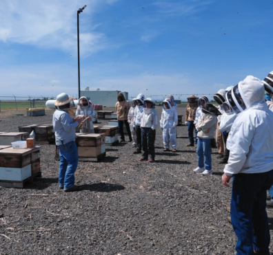 Beekeepers in Othello listening to Brandon Hopkins talk about Varroa mites